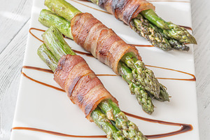 Gourmet Bacon Wrapped Asparagus With Balsamic Glaze On White Cer, a Food & Drink Photo by Alexander Prokopenko