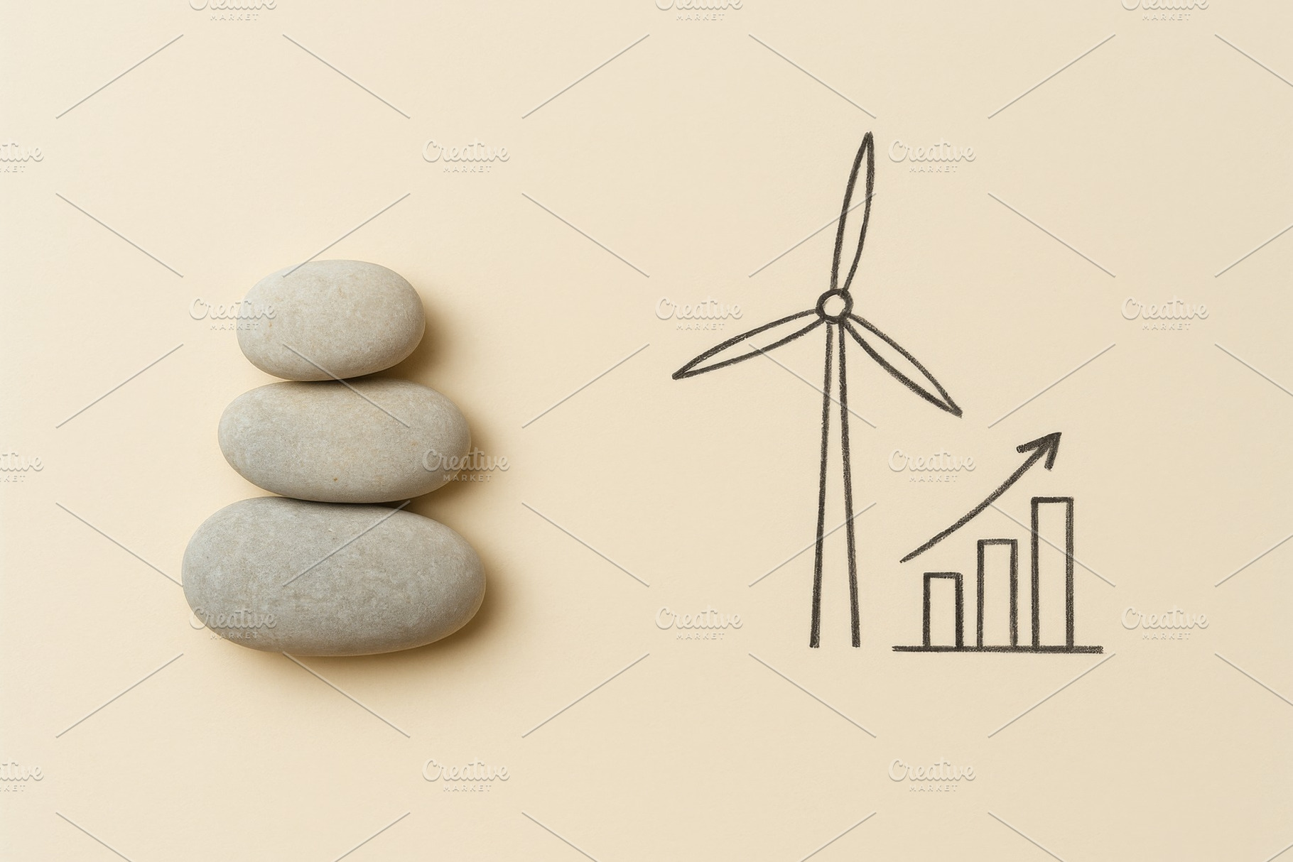Stacked stones with wind turbine and, a Photo by Dvoevnore photos