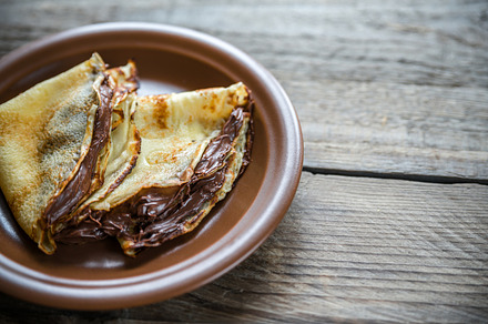Crepes with chocolate cream featuring background, baked, and breakfast, a Food & Drink Photo by Alexander Prokopenko