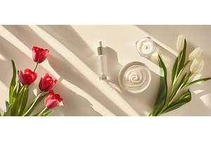 Skincare cream and serum with tulips, a Beauty & Fashion Photo by piter.goskov