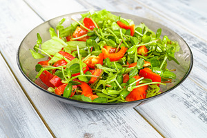 Fresh vegetable salad with micro greens and red pepper in a transparent bowl. C, a Food & Drink Photo by Eugene_Photo