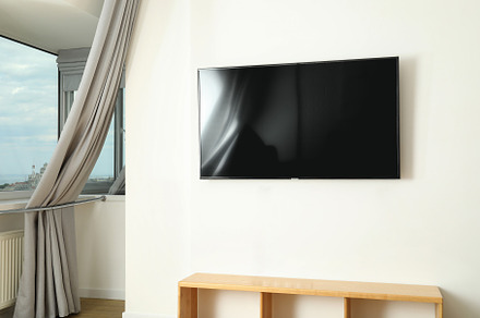 Concept of interior, room with modern TV, an Architecture Photo by AtlasStudio PRO