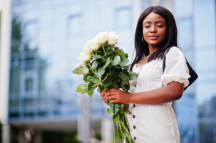 Beautiful african american girl hold containing women, bouquet, and roses, a Beauty & Fashion Photo by AS photostudio