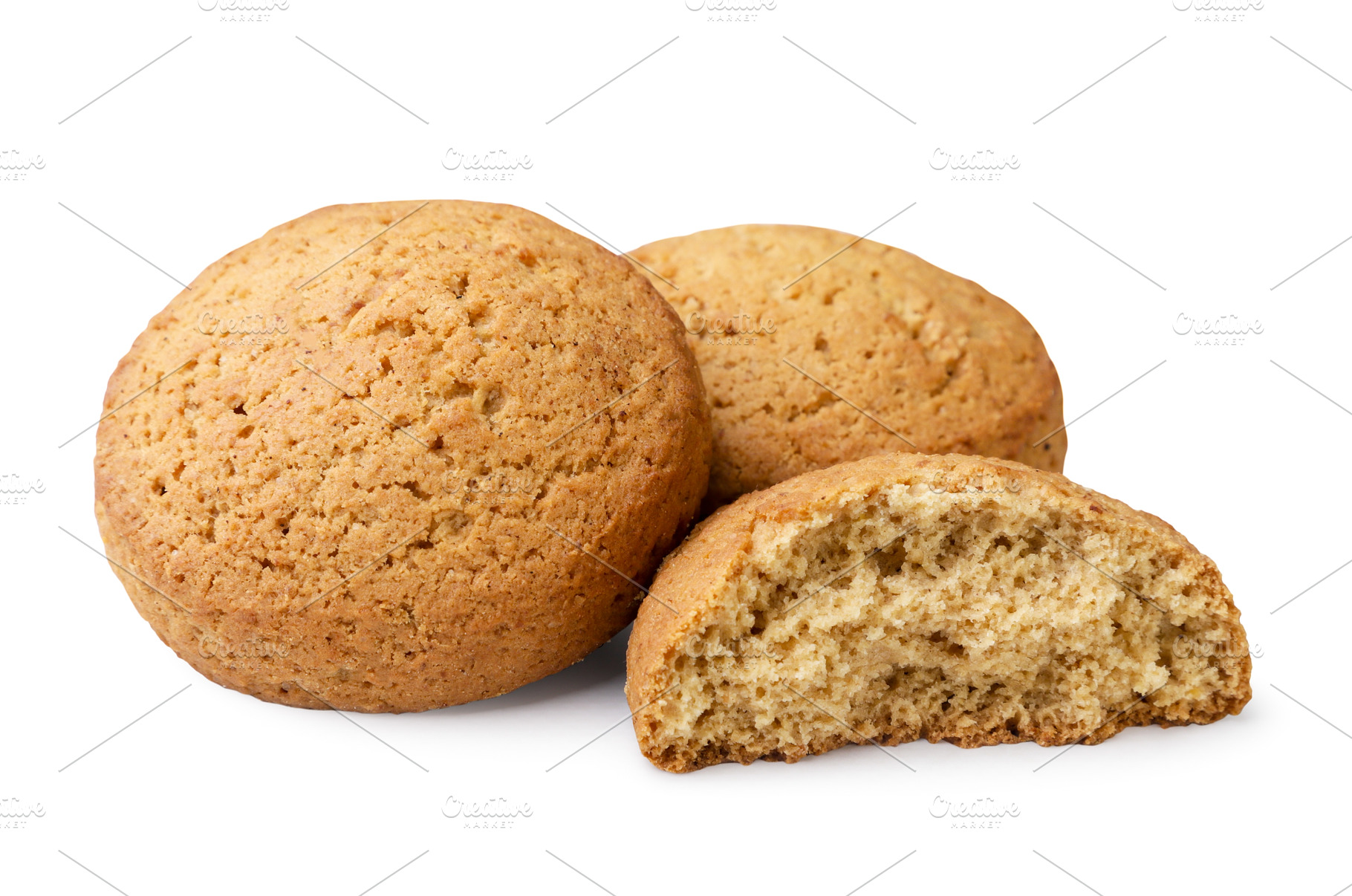 Oatmeal cookies and half on a white, a Food & Drink Photo by innakreativ