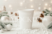 White Paper Cup with Snowy Deсor, a Product Mockup by MockupWizard (Thumbnail 1 of 3)