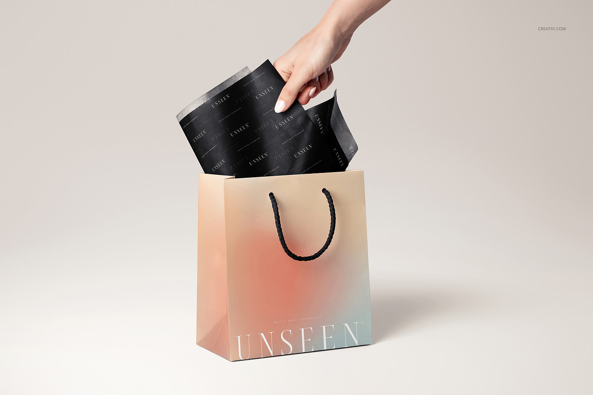 Tissue Paper in Gift Bag Mockup, a Packaging Mockup by creatsy5 (Photo 9 of 14)
