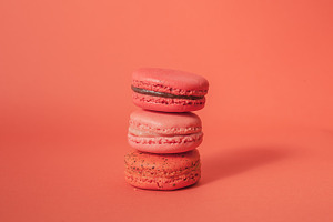 Stack of macaroons in red background