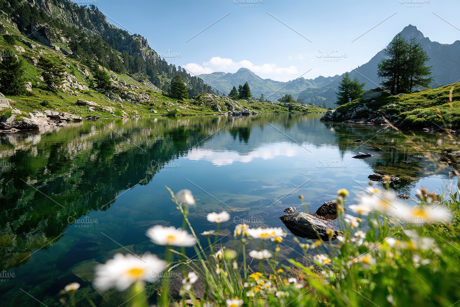 Serene alpine lake surrounded by lush green hills under a clear blue sky, a Photo by AlyaAnd