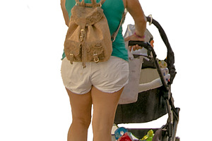 Isolated image of a woman walking with baby stroller, a Person Photo by DanFLCreativo