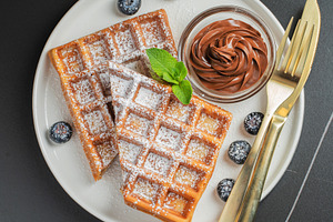 Belgium waffles Homemade waffles with strawberries, a Food & Drink Photo by Budarinphoto