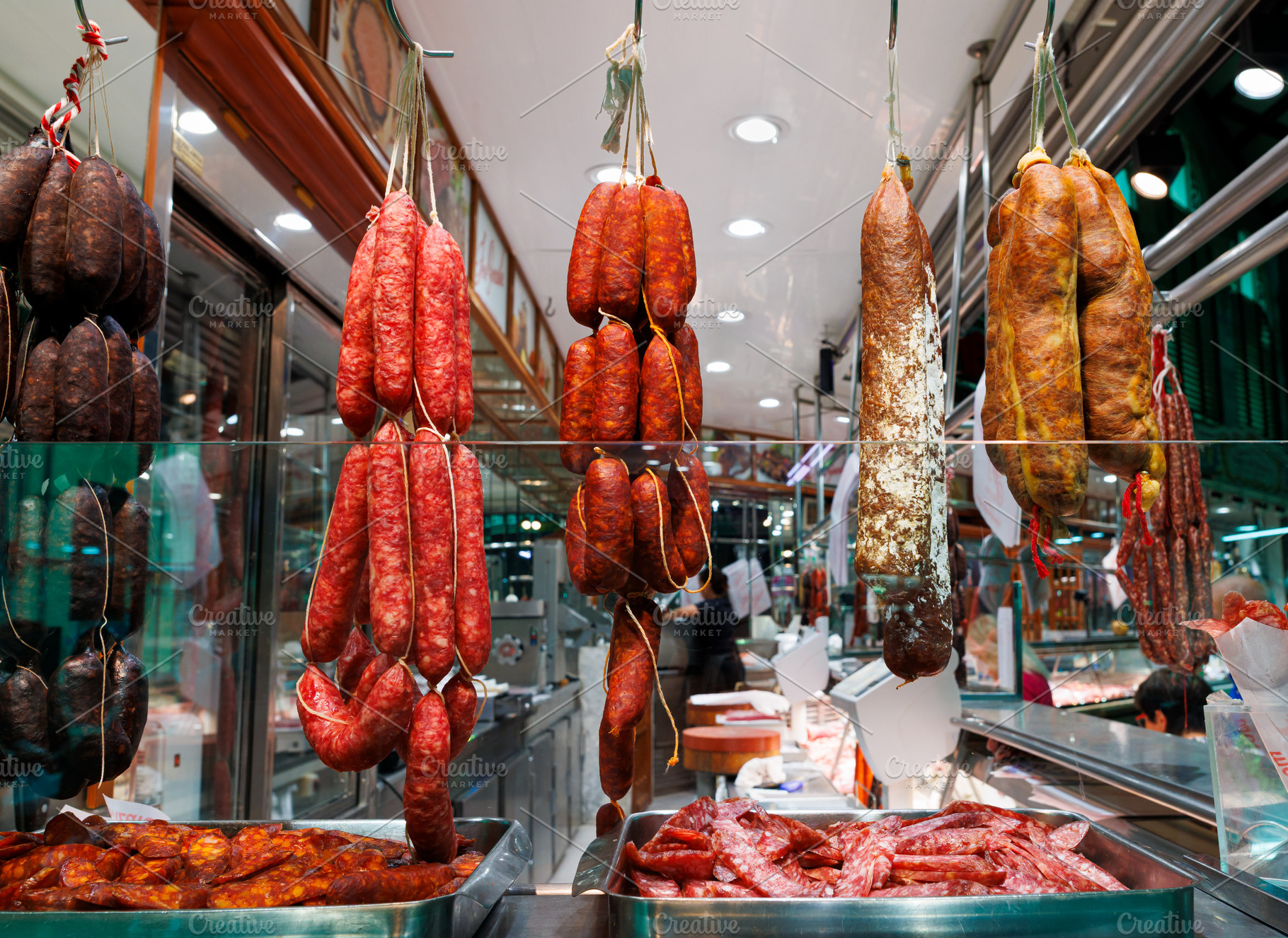 A traditional food market stall with a variety of cured sausages A Taste of Gas, a Food & Drink Photo by Bepslabor