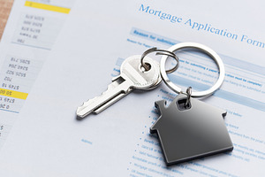 Mortgage application form with house keys representing home owne, a Business Photo by Olena Rudo