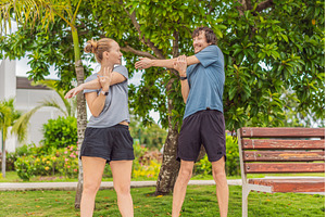 A man and woman working out together, a Person Photo by Elizaveta Galitskaya