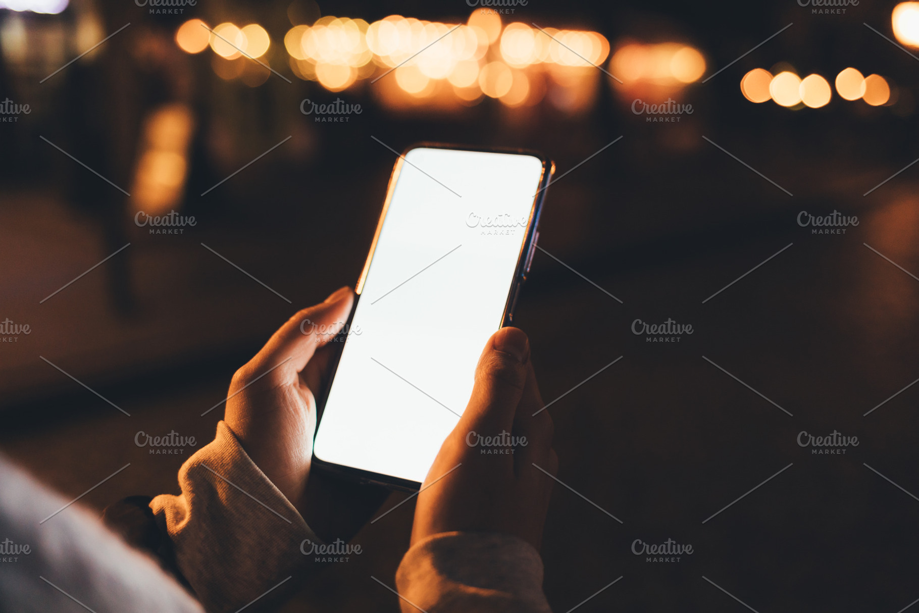 Smartphone with blank display in female hands outdoors, a Technology Photo by progressman