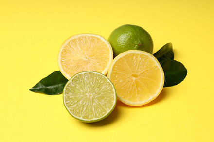 Concept of tasty food with citrus fruits on yellow background, a Food & Drink Photo by AtlasStudio