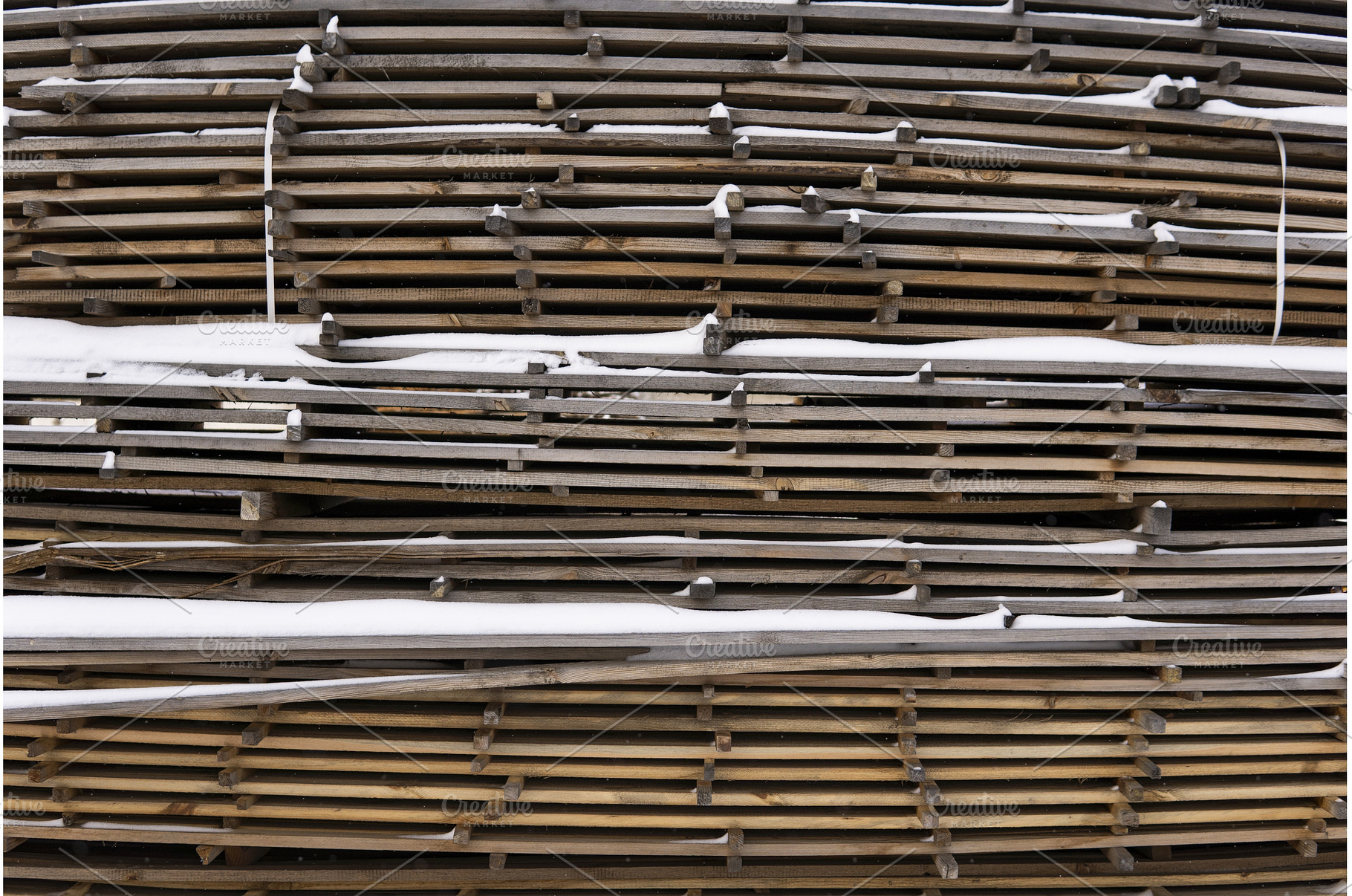 Stacked wooden boards and planks, an Industrial Photo by volodymyrshtun13795