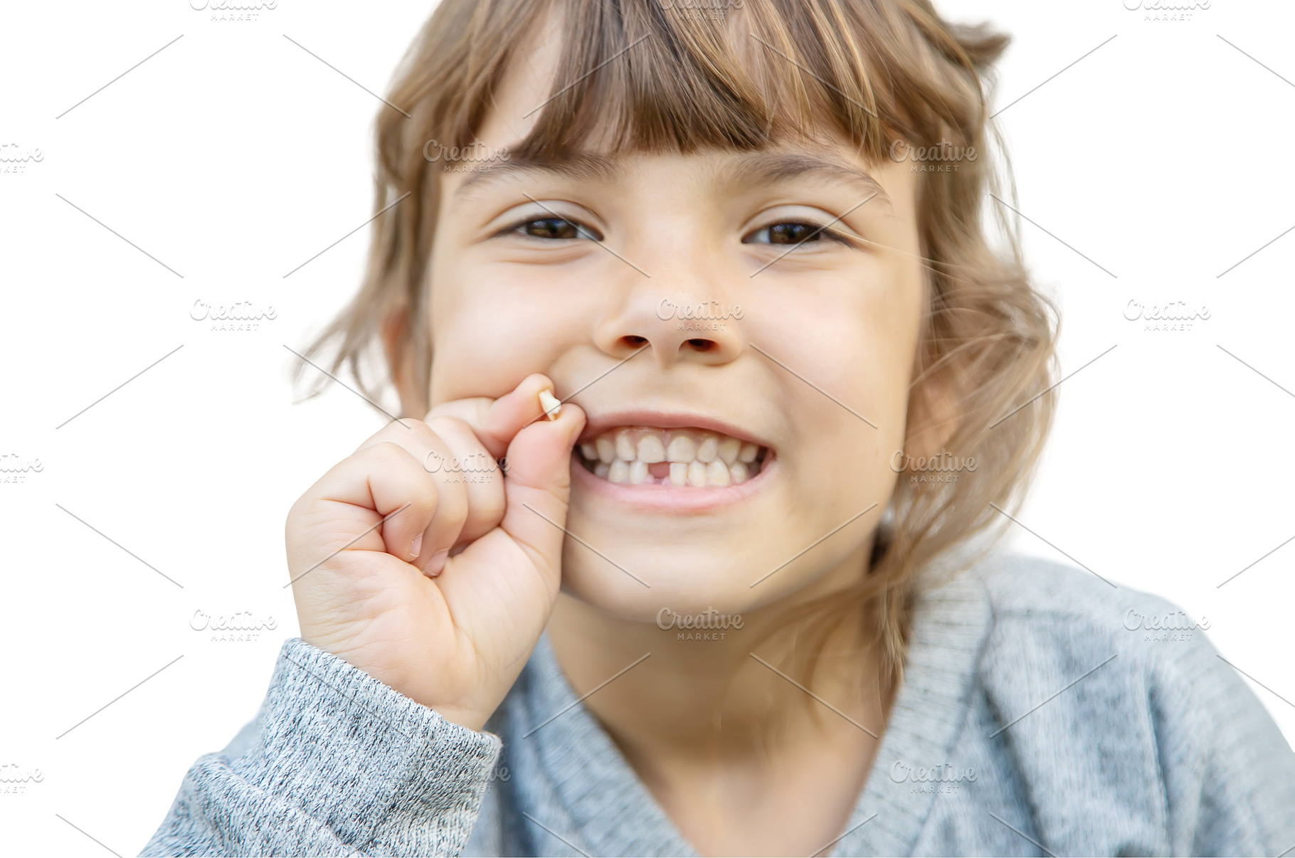 The child tooth fell out. Selective, a Health & Medical Photo by yanadjana