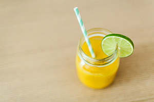 Fruit smoothie featuring fruit, smoothie, and lime