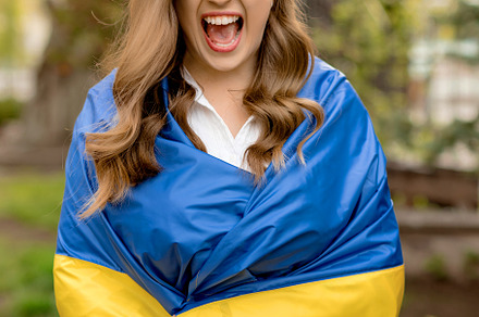 Emotionally girl with flag Ukraine
