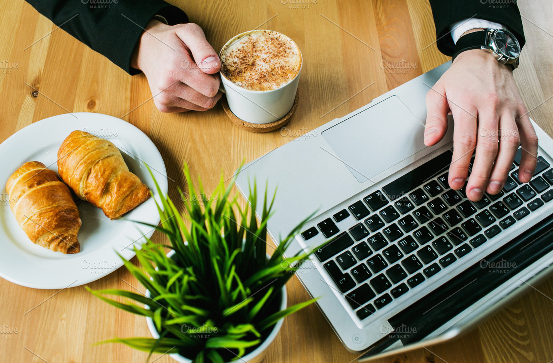 Coffee croissants and computer containing coffee, cup, and computer, a Food & Drink Photo by kosmopolya