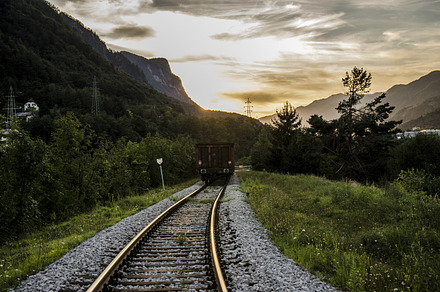 Train traveling in the sunset stock photo containing railway and tracks preview 6
