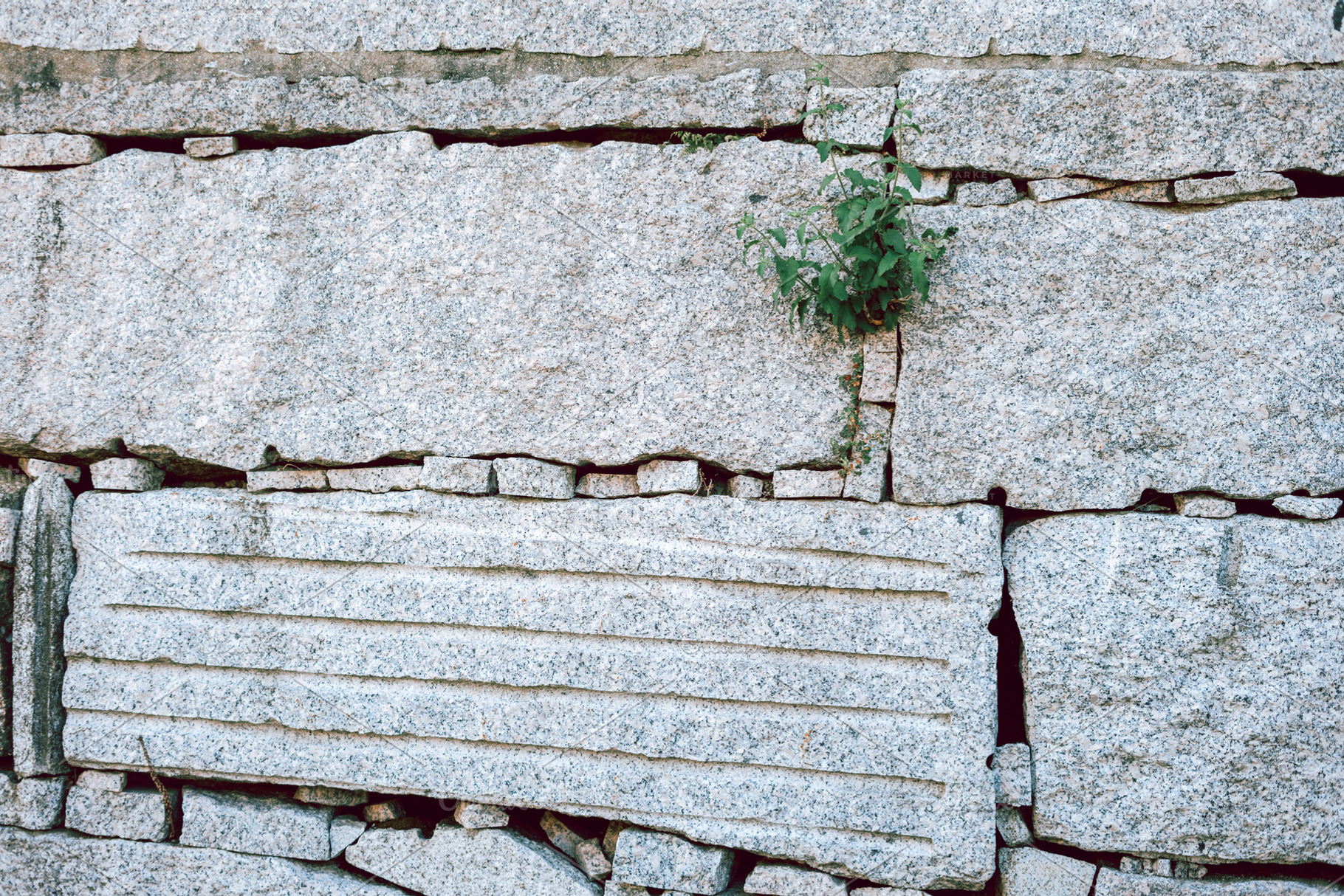 Wall made with big granite rocks, an Industrial Photo by rubenchase