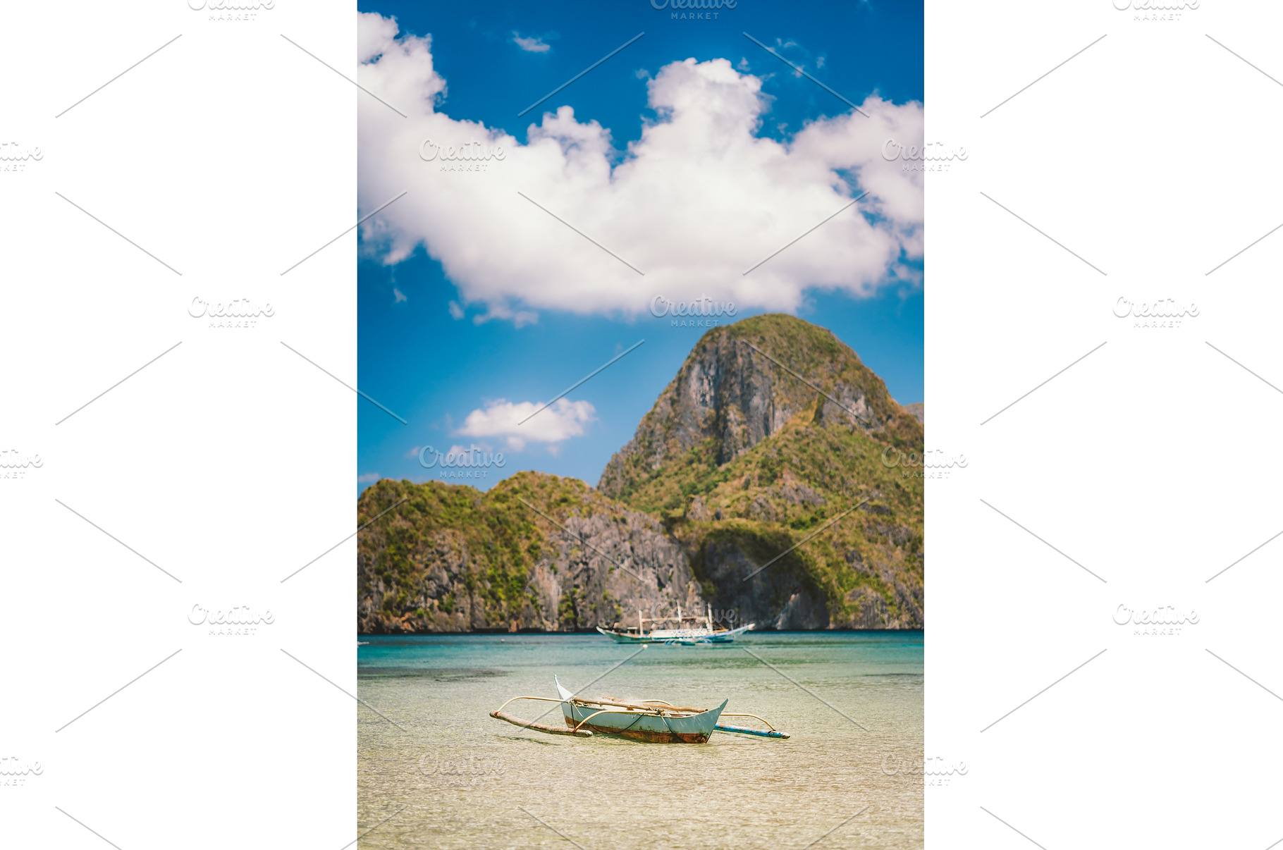 Boat in El Nido bay and Cadlao, a Nature Photo by Igor Tichonow