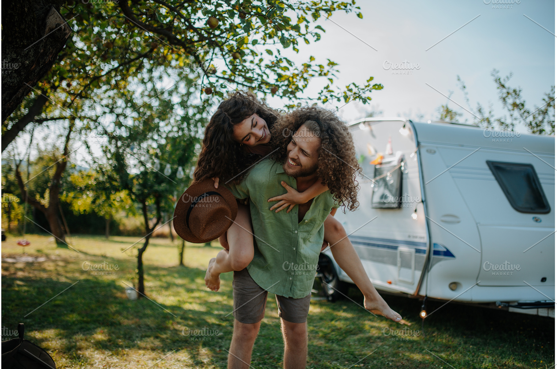 Young couple is on a camping trip in, a Person Photo by HalfPoint