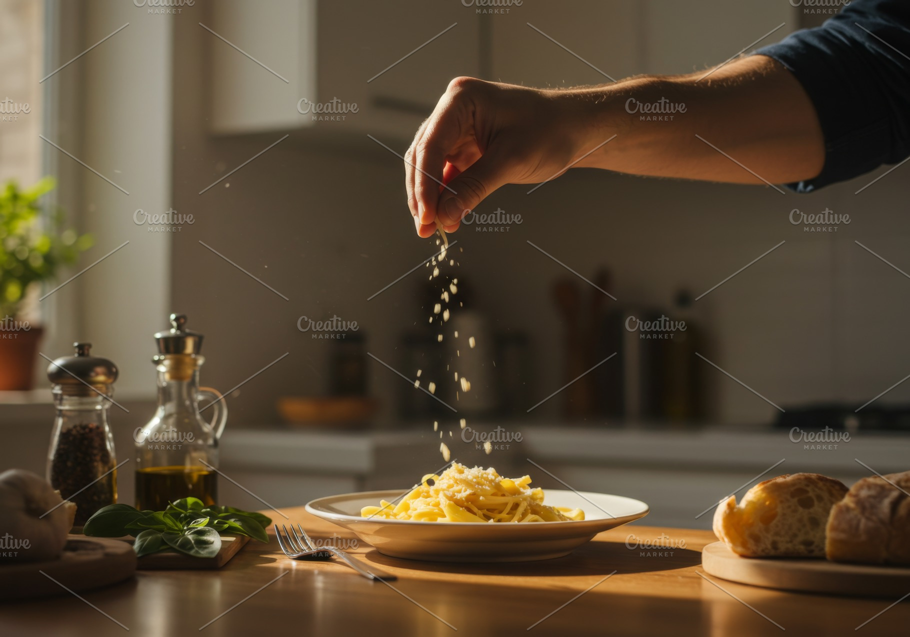 Man sprinkling grated cheese over a, a Photo by professorinc