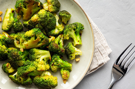Homemade Pan-Fried Broccoli on a Plate, top view. Flat lay, over, a Food & Drink Photo by LiudmylaChuhunova