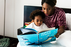 African family featuring african descent, black, and book, a Person Photo by rawpixel