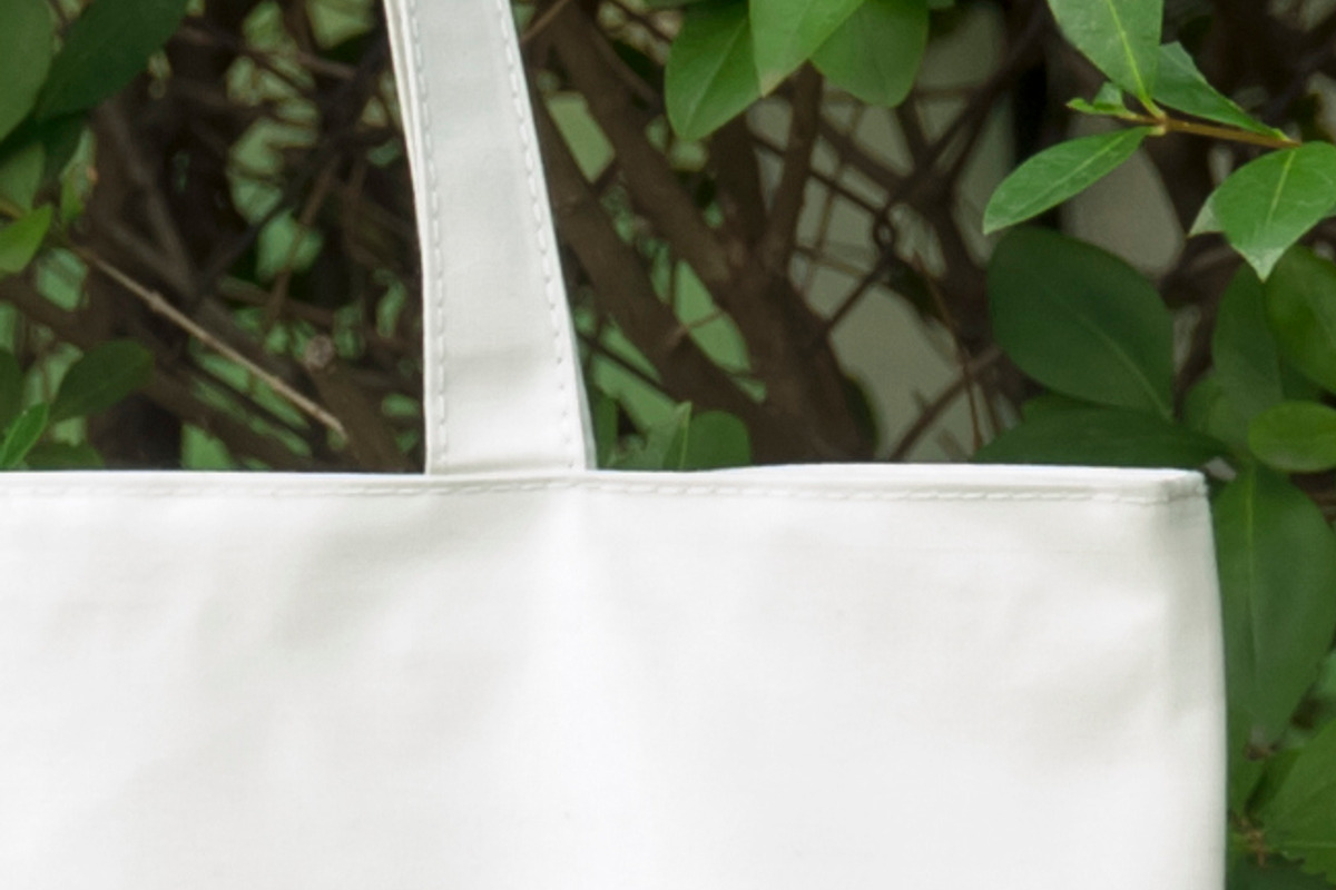 Tote bag mockup containing tote bag mockup, fabric, and background, a Beauty & Fashion Photo by Leo Flo Mockups (Photo 2 of 3)