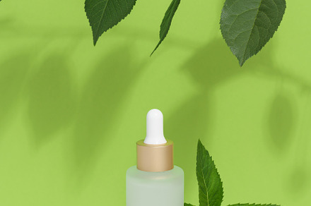 White glass bottle with pipette and mint leaves, container for a, a Beauty & Fashion Photo by ndanko
