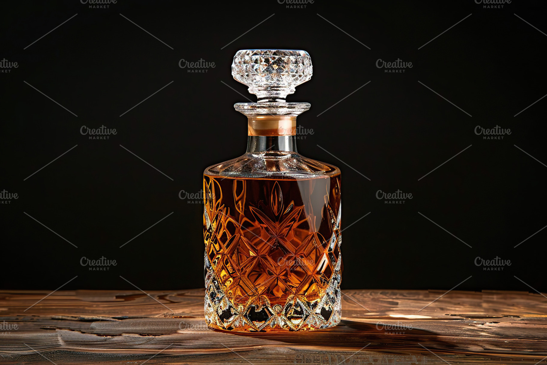 Crystal bottle of scotch whiskey on black background, a Food & Drink Photo by AlyaAnd