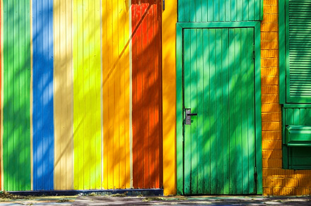 multi-colored wooden wall and door in the house, Kiev, Ukraine, an Abstract Photo by TanaCh