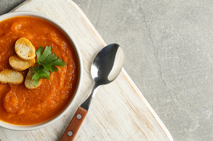 Composition with bowl of pumpkin puree with croutons on gray bac, a Food & Drink Photo by AtlasStudio PRO