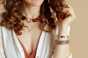 happy stylish female in blouse and shorts isolated on beige, a Person Photo by Alliance Images