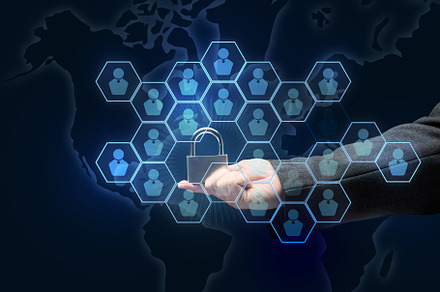 male hand holding a metal padlock on a dark blue background, a Business Photo by ndanko