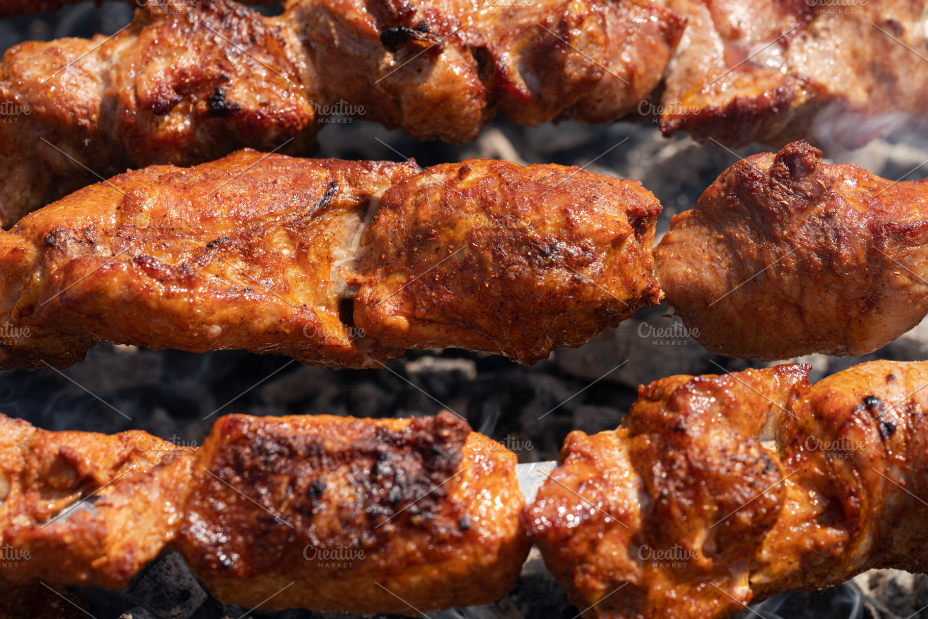 Grilled pork shish kebab cooking, a Food & Drink Photo by Alexander-Piragis