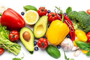 Fresh healthy eating ingredients arranged on white background, a Food & Drink Photo by Olena Rudo