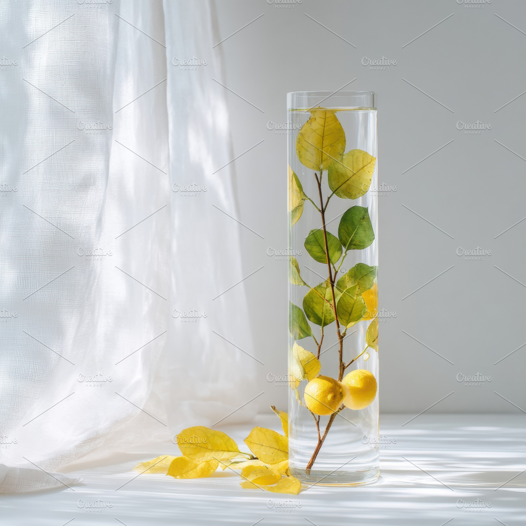 Lemon branches, tall glass cylinder, an Architecture Photo by Virgo Studio