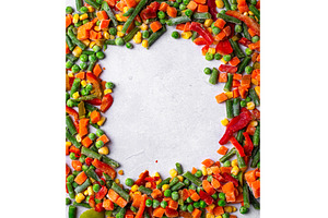 Frozen mix of vegetables on dark, a Food & Drink Photo by Yulia Furman