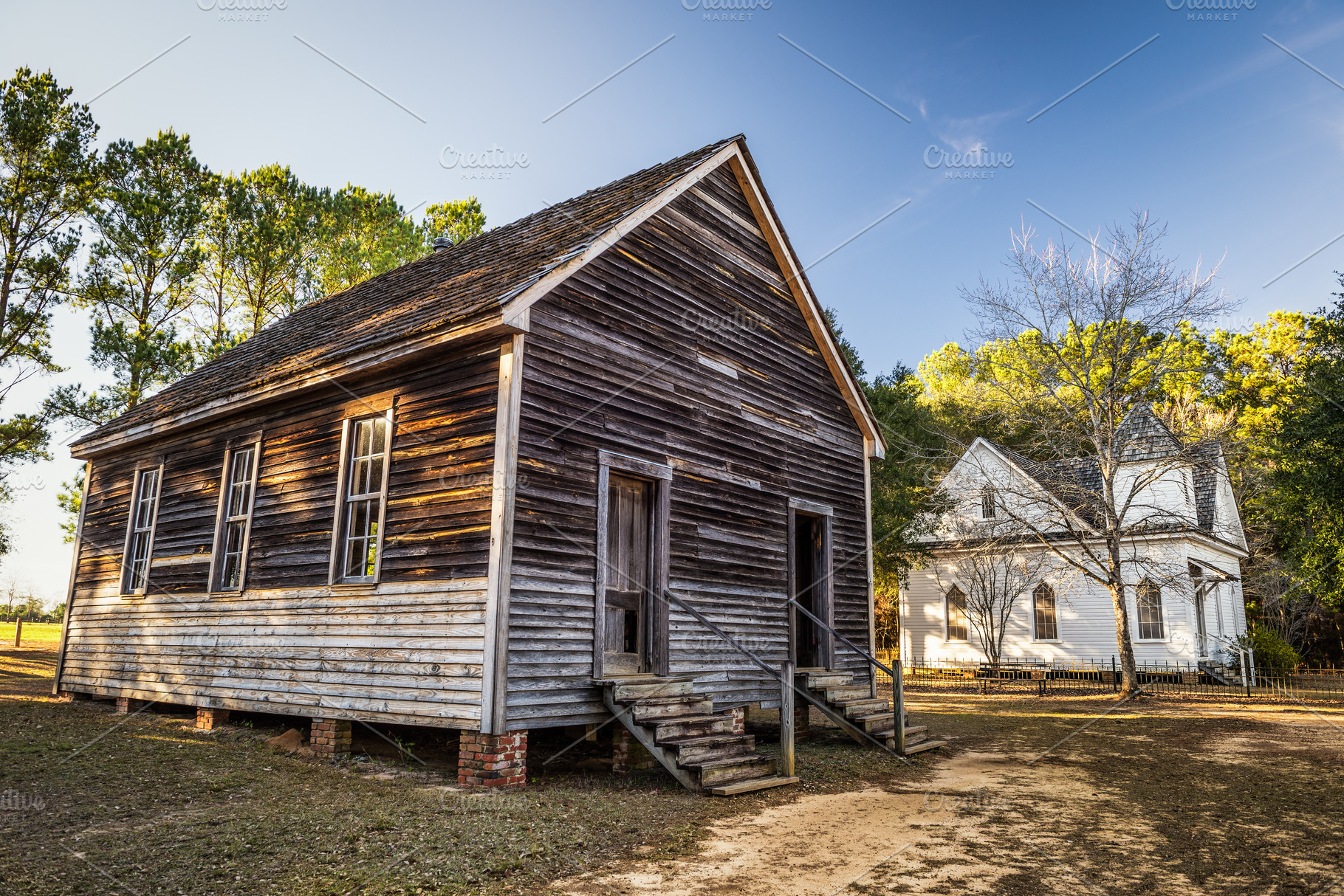 Old houses in a historic landmark park stock photo containing wiregrass and, an Architecture Photo by Nick Fox