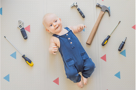 Adorable baby in a mechanic costume