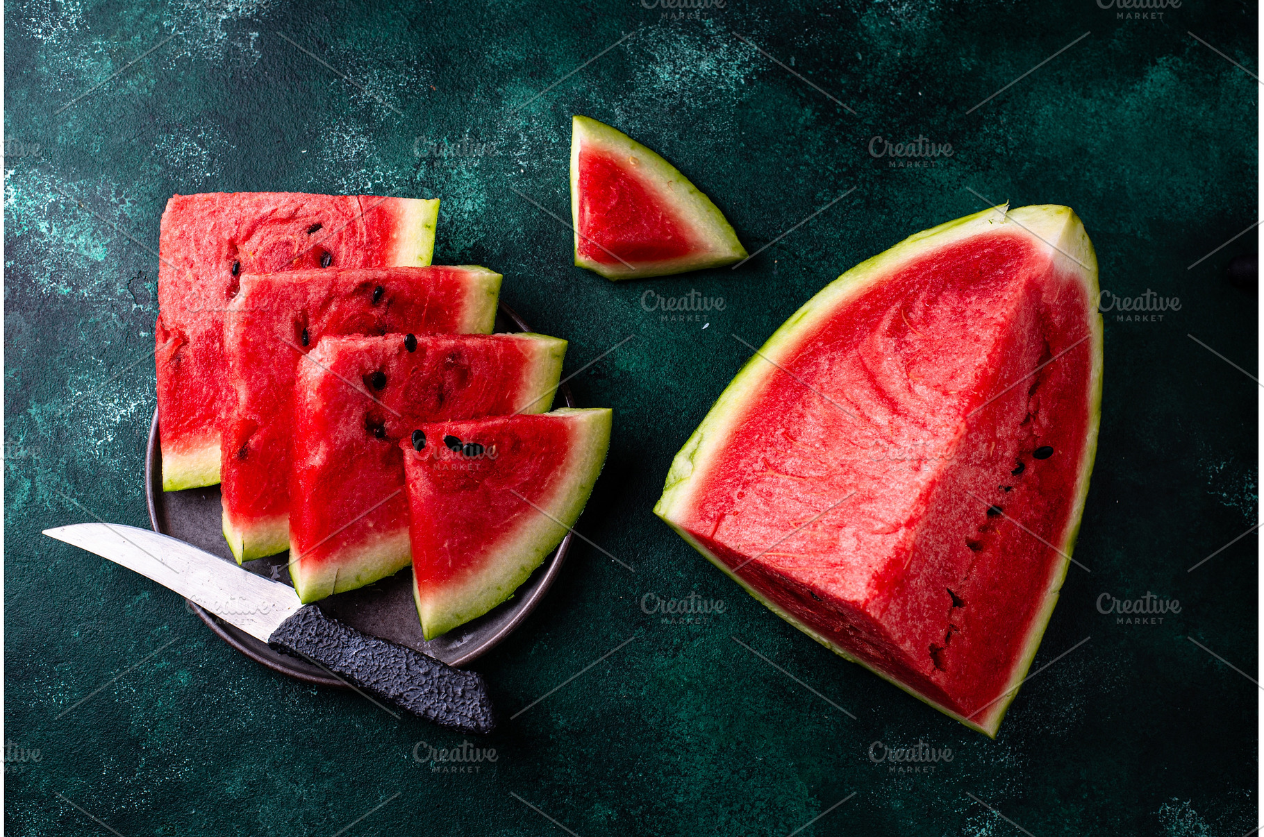 Sliced watermelon on green, a Food & Drink Photo by Yulia Furman
