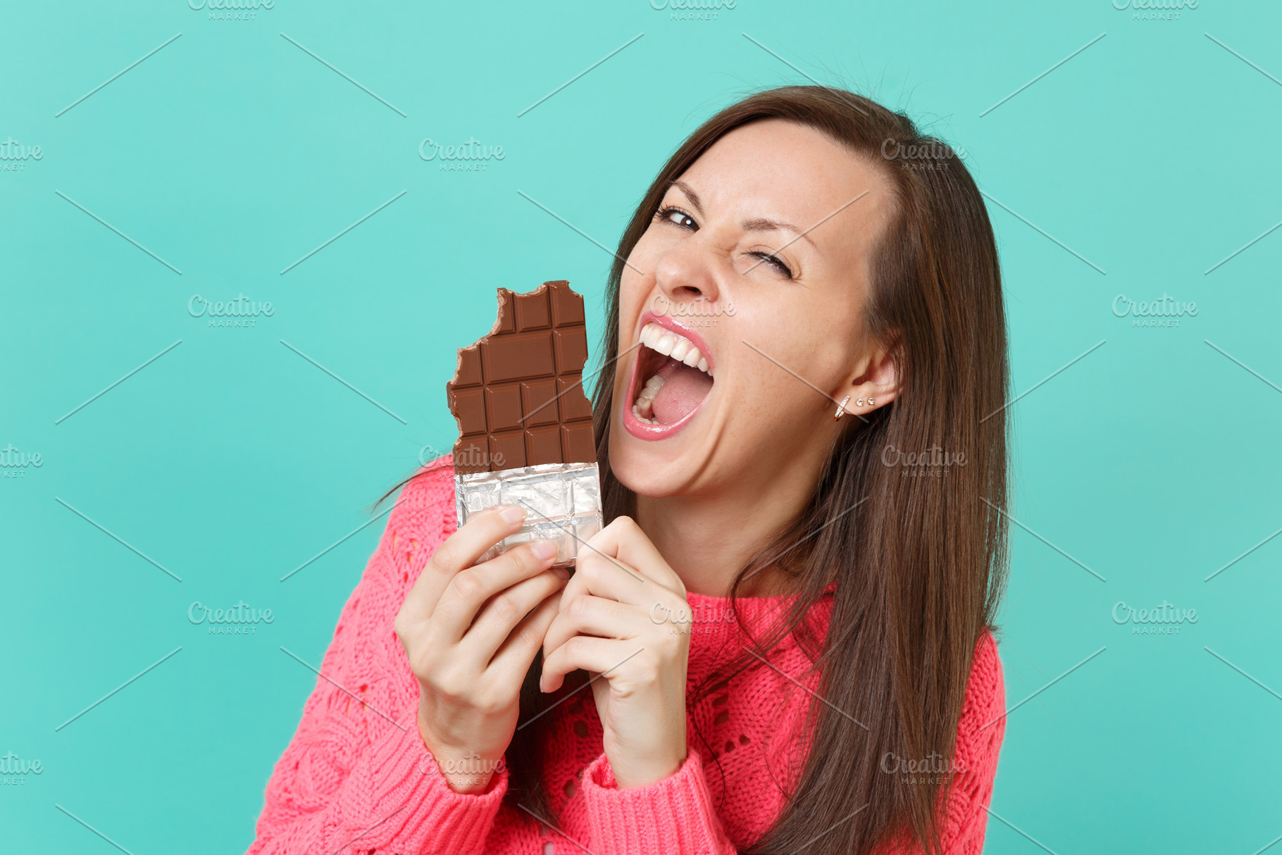 Crazy cheerful young woman in knitte, a Person Photo by ViDi Studio