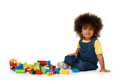 Lovely girl with plastic blocks
