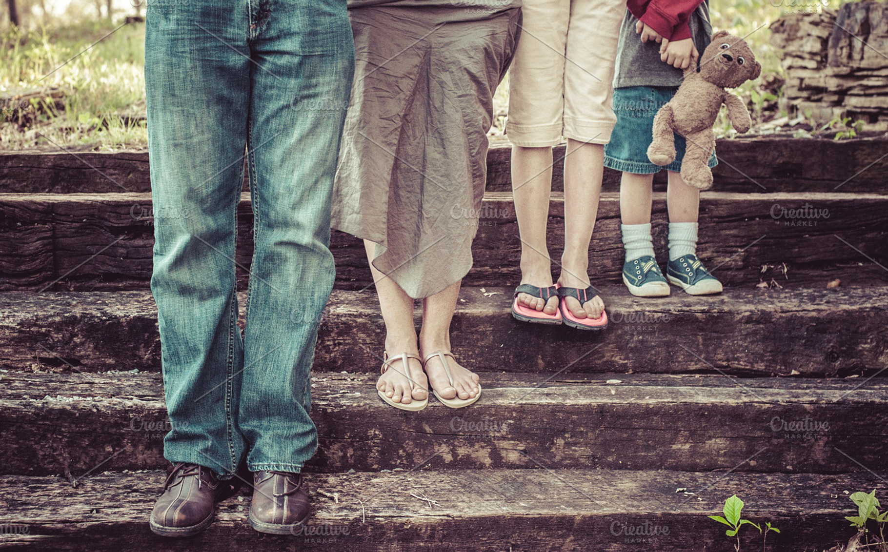 Family on steps, a Person Photo by Mission Media