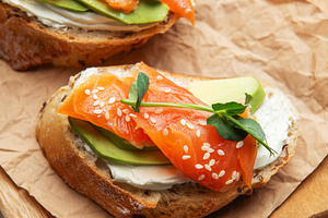 Salmon avocado toast with cream cheese and greens, a Food & Drink Photo by Olena Rudo