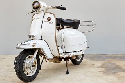 Scooter Lambretta vintage motorcycle, a Background Photo by 1981 Rustic studio kan